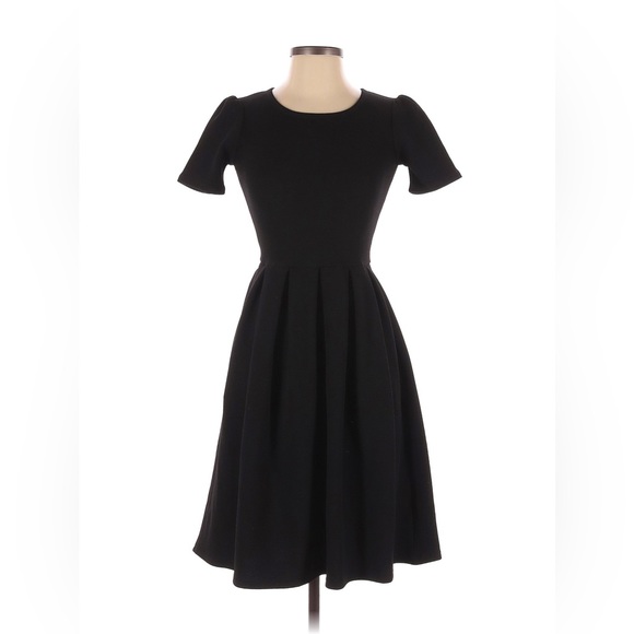 LuLaRoe Dresses & Skirts - Solid black lularoe Amelia dress. Small